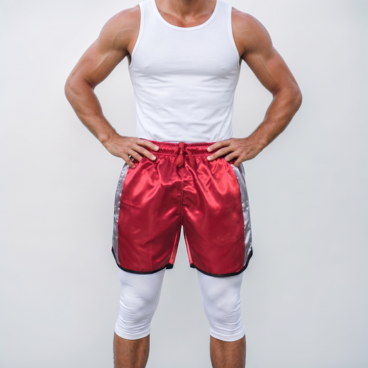 Shiny red nylon sports shorts with grey striping