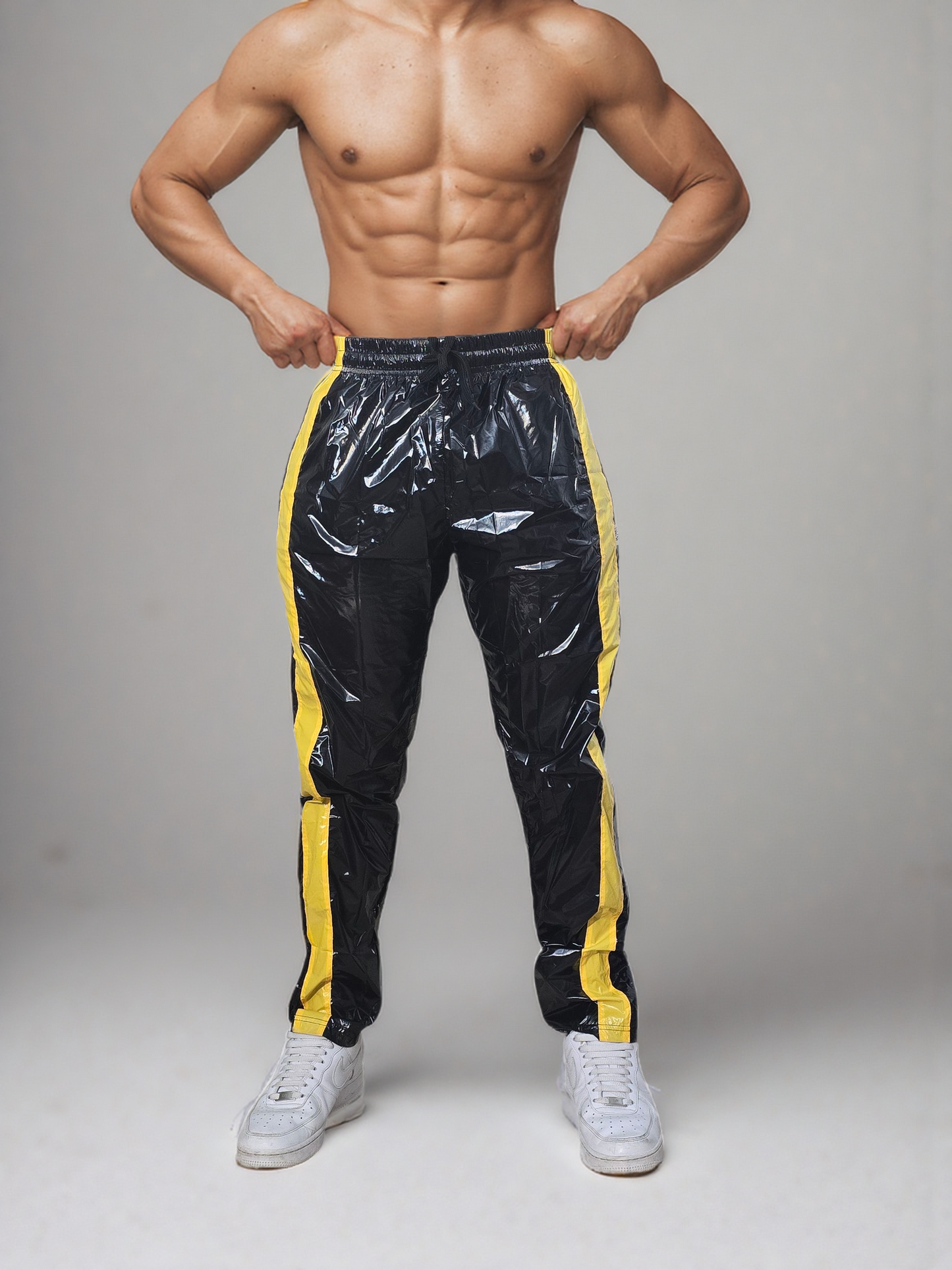 .PU nylon sport jogging pants made of PU gloss nylon yellow strips