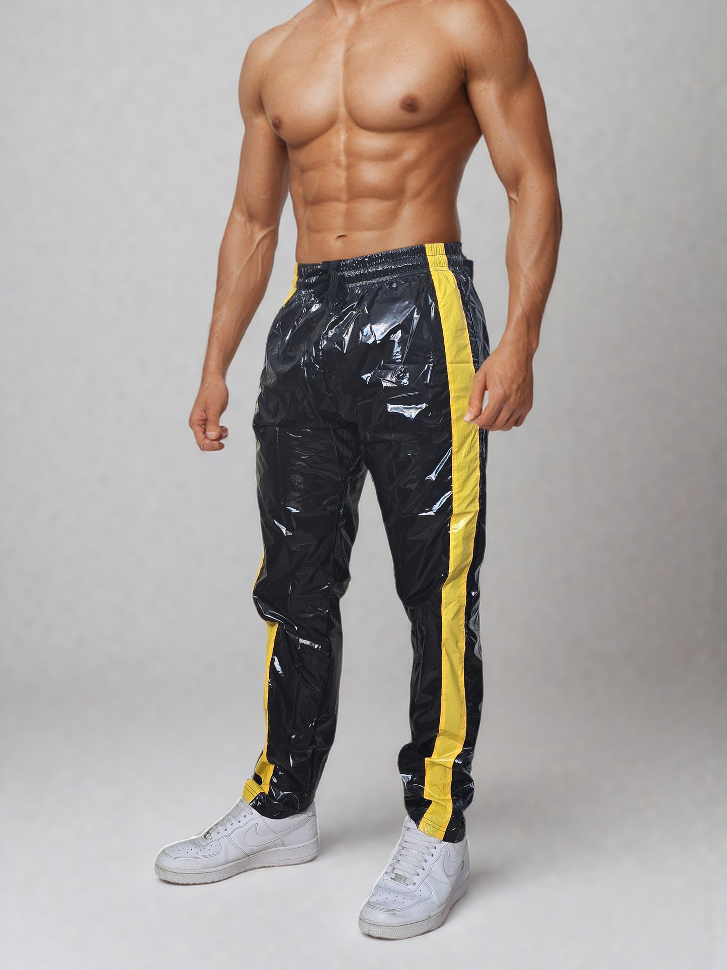 .PU nylon sport jogging pants made of PU gloss nylon yellow strips