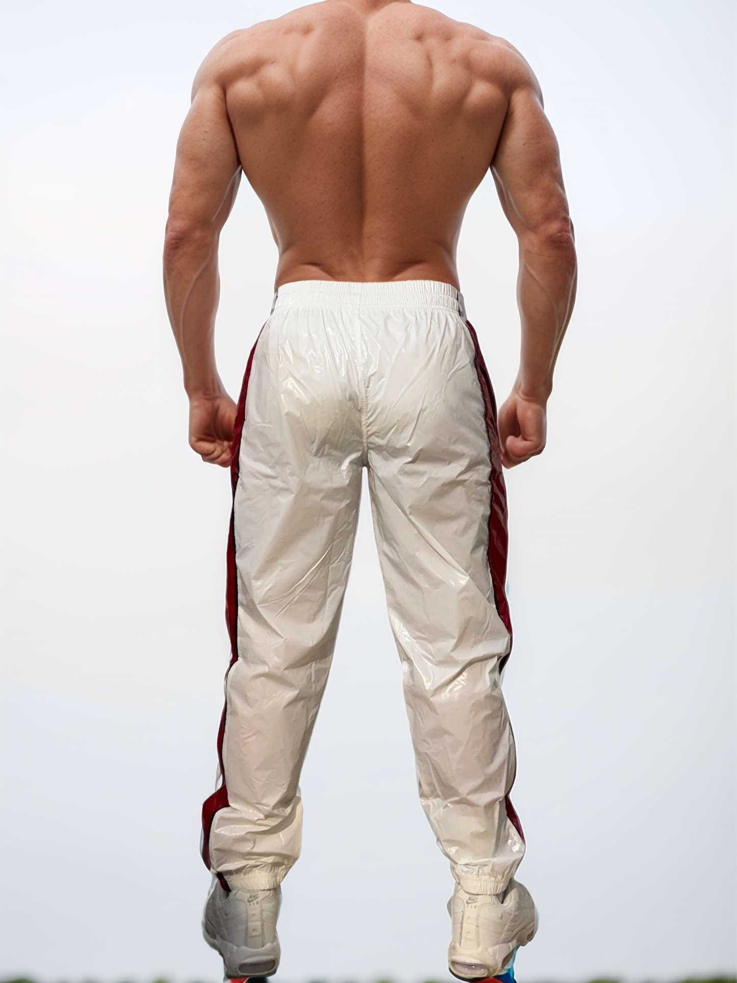 .PU nylon sport jogging pants made of PU gloss nylon White / red strips